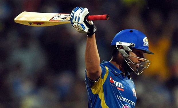 Rohit Sharma of the Mumbai Indians raises his bats after scoring a half century during an IPL 7 match against Royal Challengers Bangalore in Mumbai (Photo: PTI) Rohit Sharma of the Mumbai Indians raises his bats after scoring a half century during an IPL 7 match against Royal Challengers Bangalore in Mumbai (Photo: PTI)